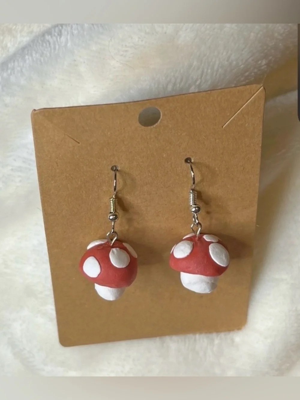 Super Mario-inspired Handcrafted mushroom dangle earrings.